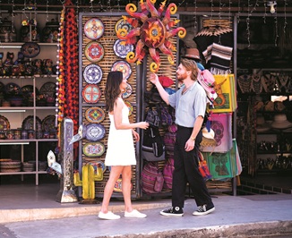 Historic cobblestone streets decorated with flags for the Thursday Art Walk