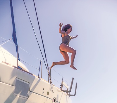 Luxury yacht charter during sunset in Los Cabos